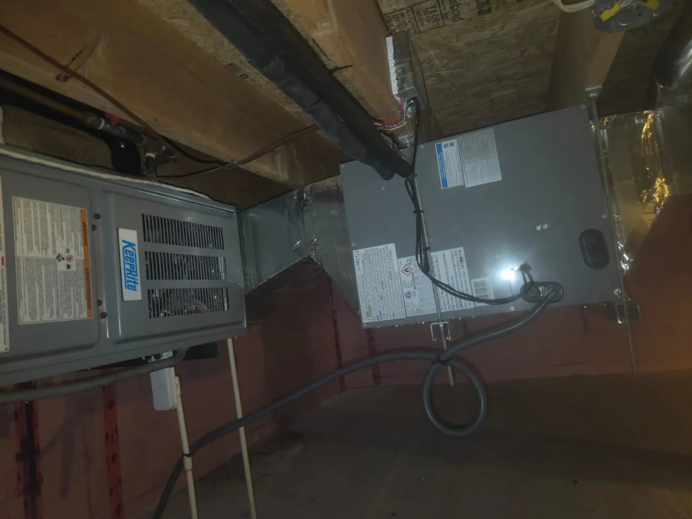 Horizontal air handler installed in a crawl space