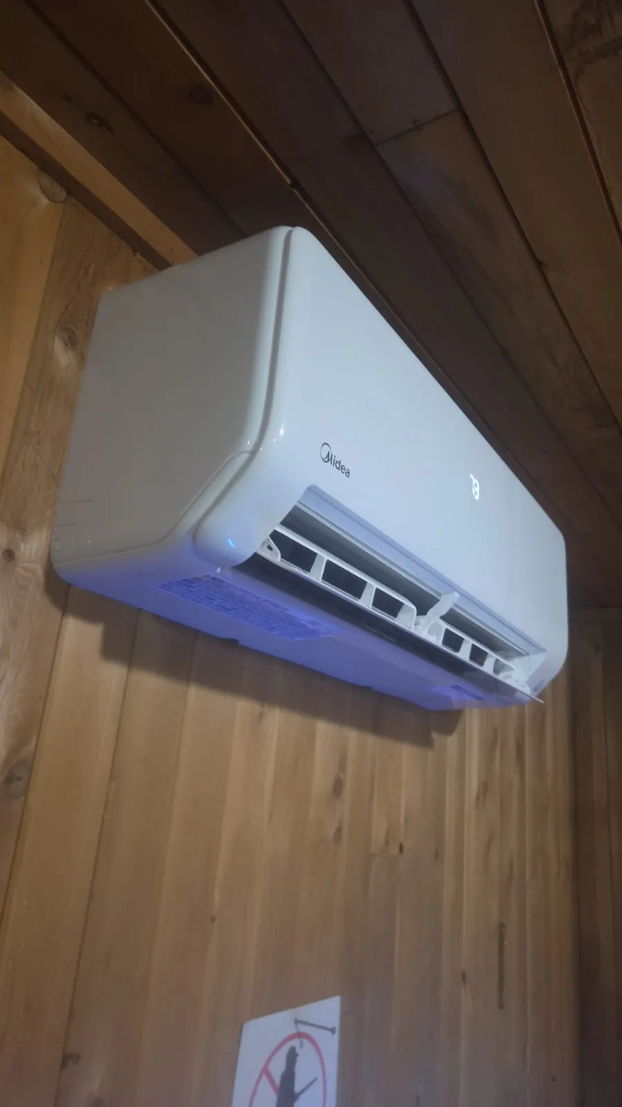 Midea ductless unit on cedar boards