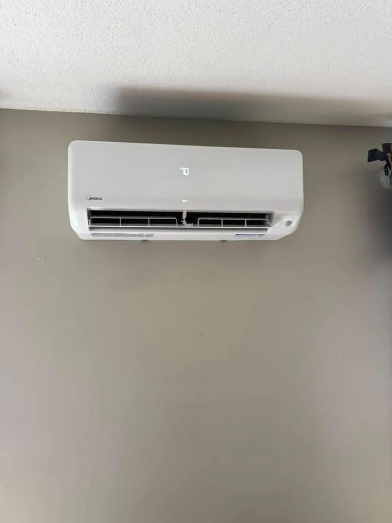Midea ductless wall unit with a clean, level install