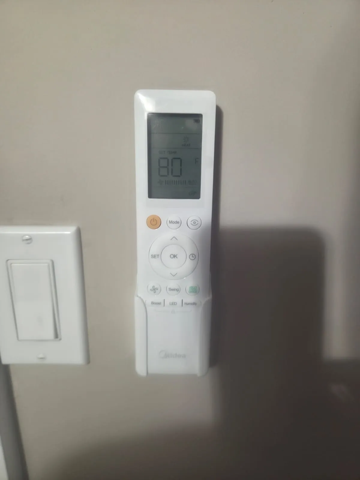 Ductless remote mounted beside a light switch