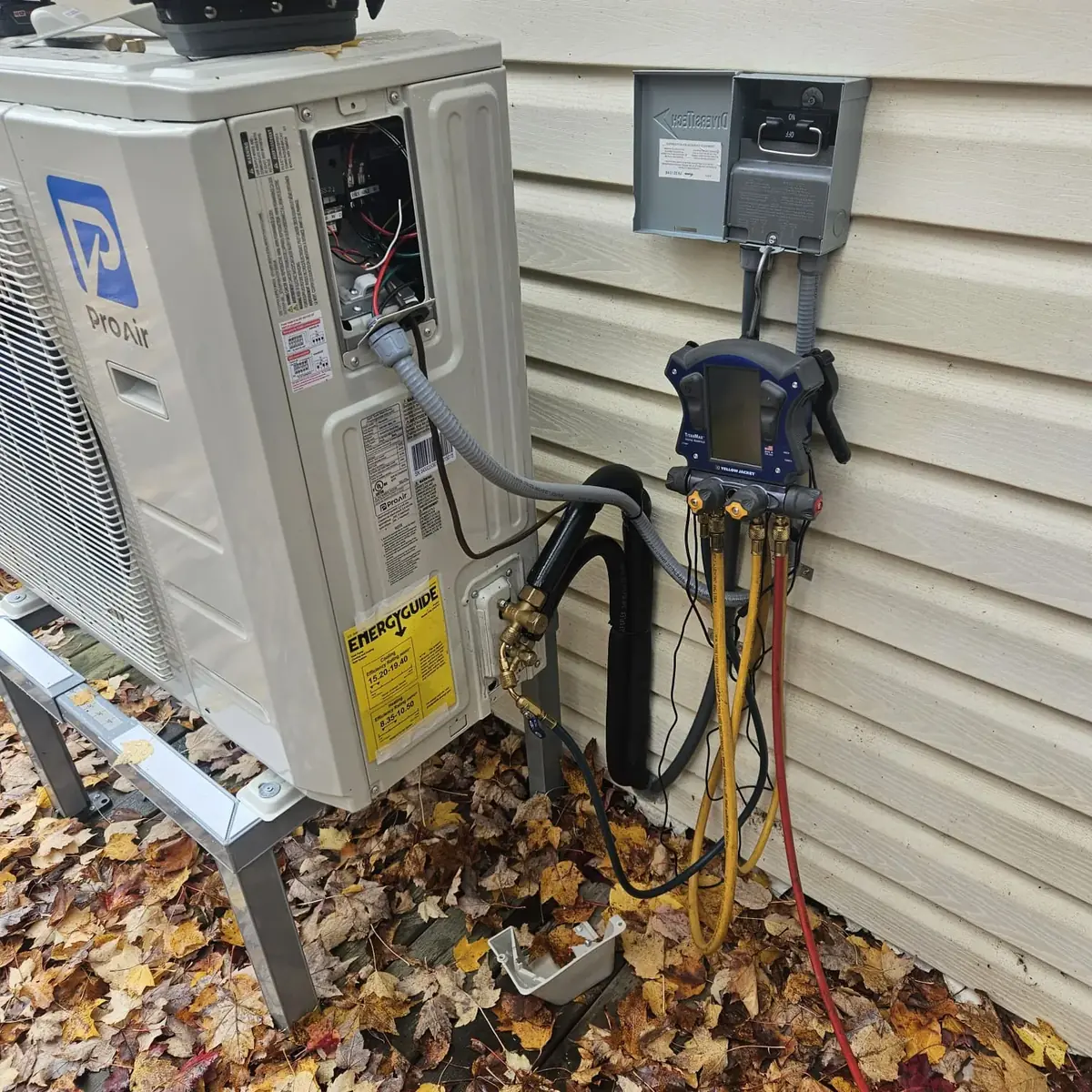 Gauges connected to a new heat pump during commissioning