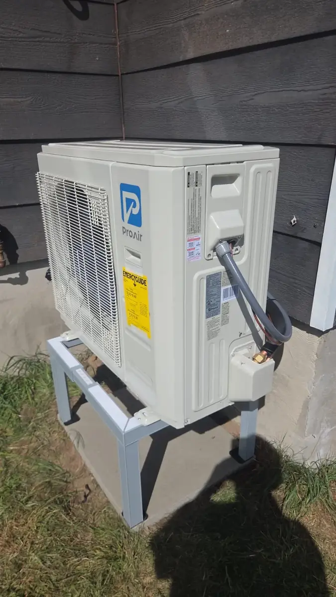 Outdoor heat pump on a stand with a sealed line set