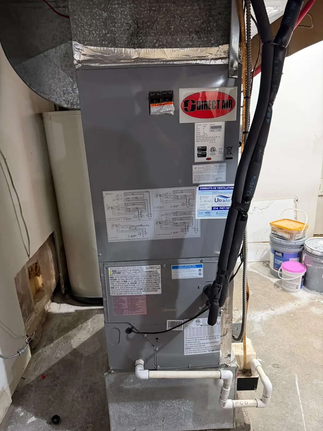 Indoor air handling unit with insulated supply ductwork and condensate line
