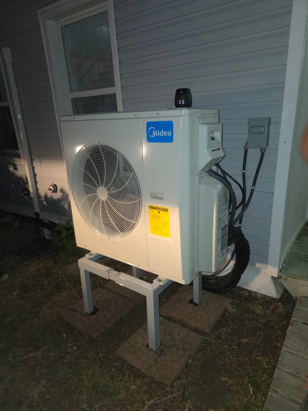 Midea outdoor unit with line set and outdoor disconnect